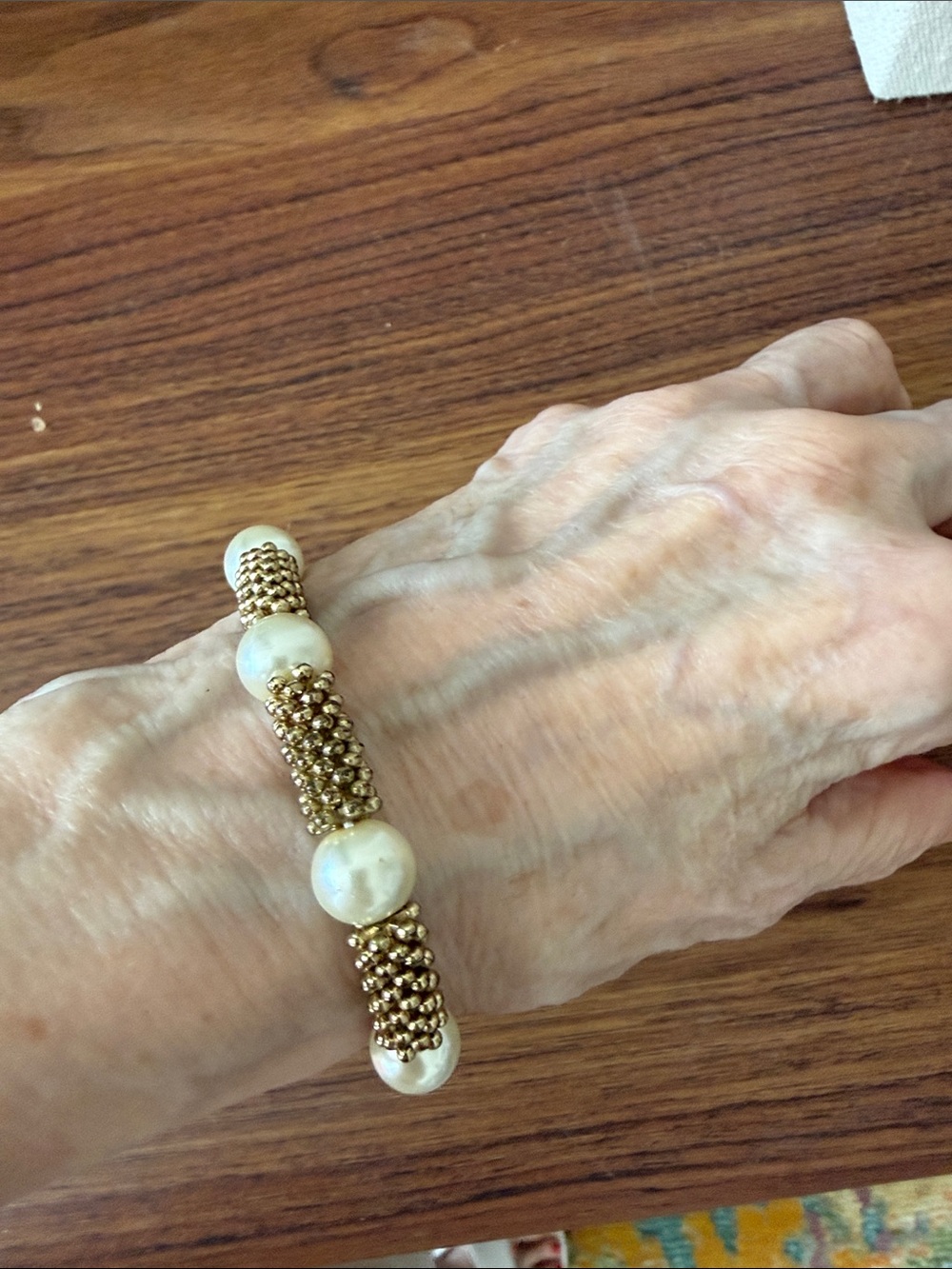 Stretchy Gold Tone Beaded & Pearl Accent Bracelet.